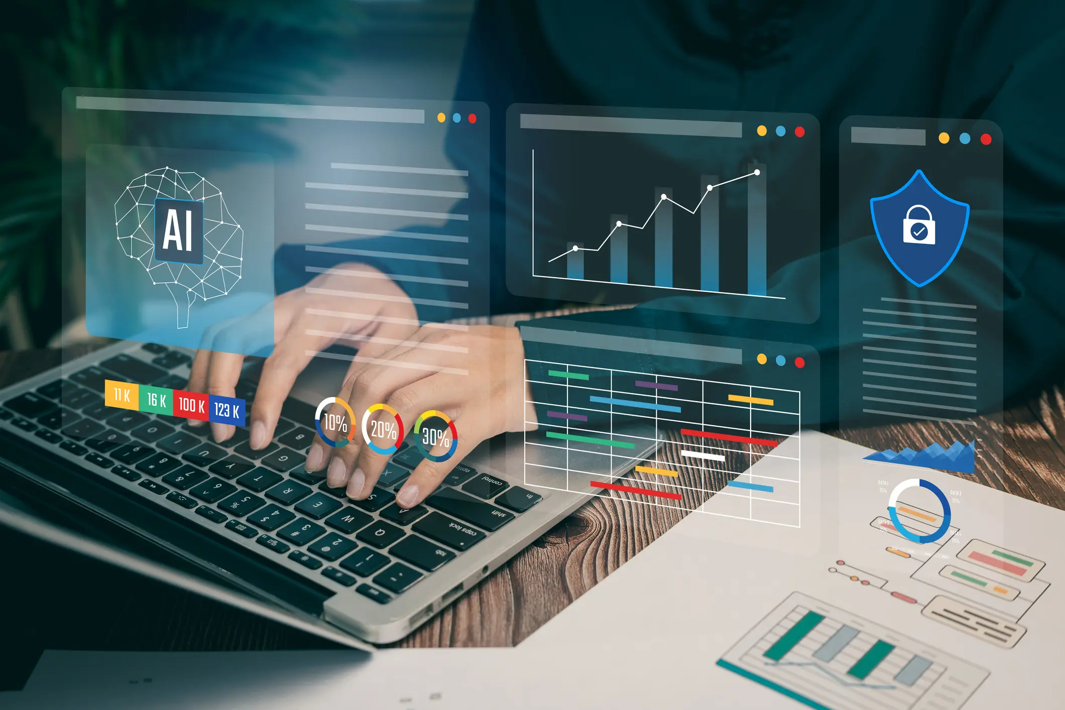 Hands typing with virtual data graphics overlay.